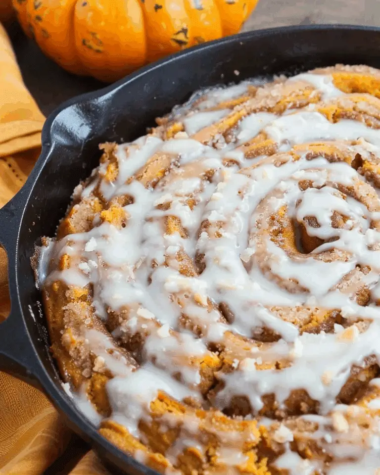 Pumpkin Cinnamon Roll Skillet Cake with Spice Icing