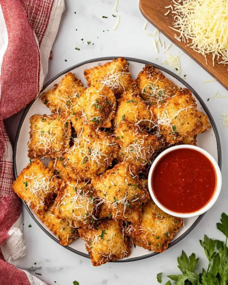 Crispy Fried Ravioli with Parmesan and Herb Garnish Recipe