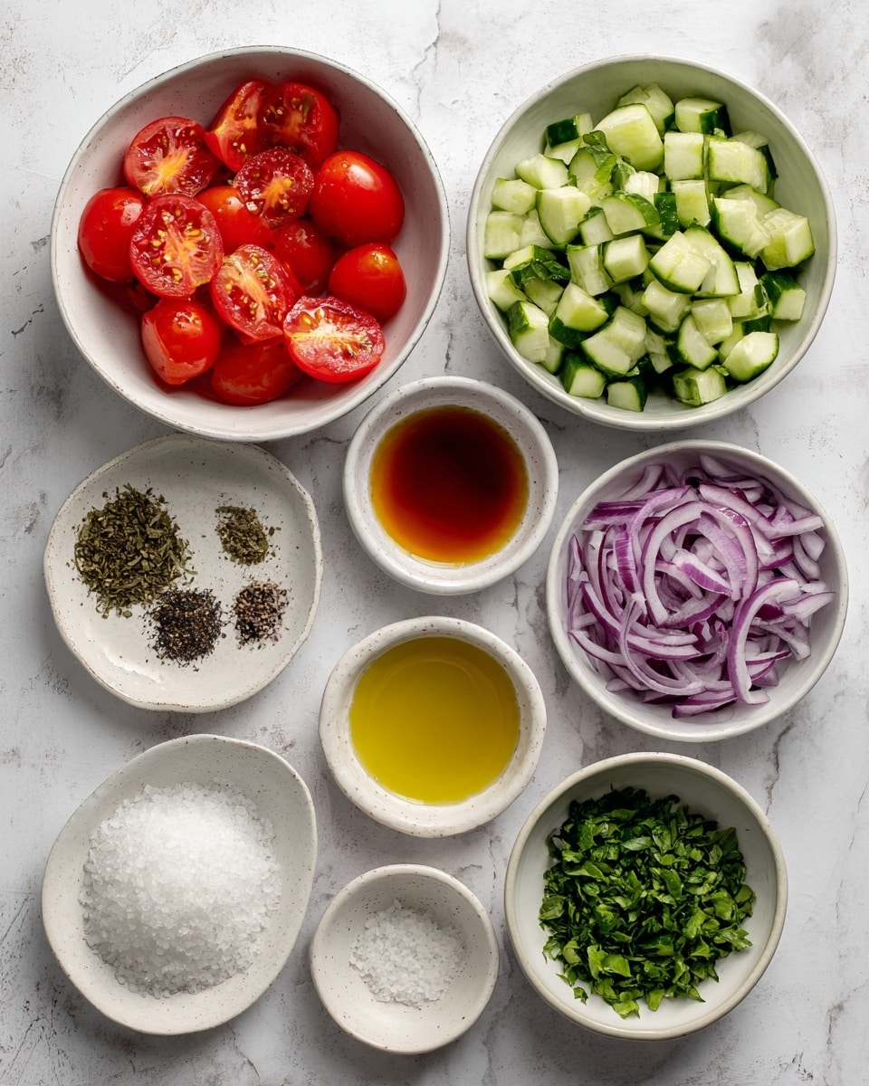 A top view image shows eight white bowls on a white marbled surface, each holding different salad ingredients. The largest bowl, placed at the top left, contains bright red grape tomatoes halved to show their juicy insides. Below it, a medium-sized bowl holds chopped cucumbers with dark green skin and pale green flesh in small chunks. On the left bottom side, a small white plate displays dried basil with a dark green, crumbly texture, and separate piles of salt and black pepper. To the right of the grape tomatoes, a small bowl filled with thinly sliced purple-red red onions sits near the top right. Just below, a small white bowl with clear golden olive oil, and below that, a similar bowl contains white sugar granules. To the bottom right, a bowl holds finely chopped green parsley, and next to it, a bowl is filled with amber-colored red wine vinegar. The arrangement is neat and evenly spaced. Photo taken with an iphone --ar 4:5 --v 7