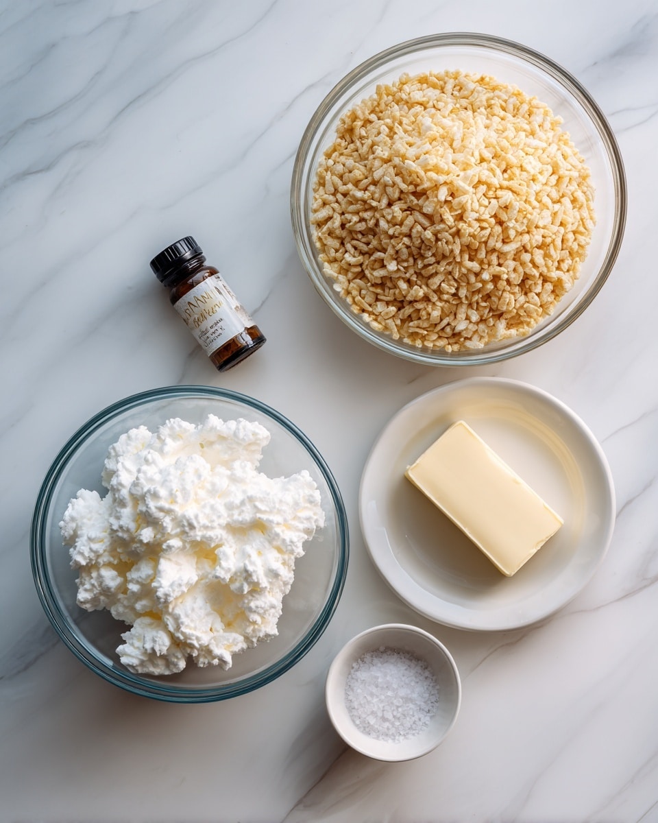 A top-down view of five ingredients placed separately on a white marbled surface, including a large clear glass bowl filled with light tan Rice Krispies at the top center, a medium clear glass bowl containing white, fluffy Marshmallow Fluff at the bottom center, a small white bowl with a rectangular block of pale yellow Butter to the right, a tiny white bowl filled with granular white Salt on the left, and a small, dark brown bottle of Vanilla extract positioned between the Salt and Butter. photo taken with an iphone --ar 4:5 --v 7