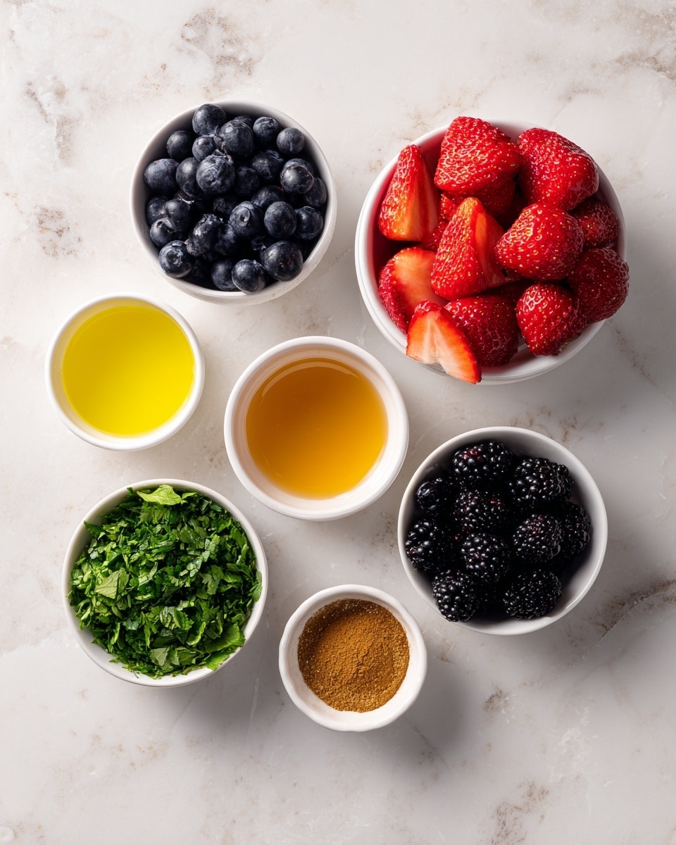 The image shows seven small white bowls arranged on a white marbled surface, each containing a different ingredient. The largest bowl at the top right is filled with bright red strawberries, some whole and some sliced, showing their juicy texture. Below it and slightly to the left is a bowl filled with dark purple blueberries that have a soft, smooth look. To the bottom right is a bowl of blackberries, deep black with a shiny, bumpy surface. Near the top left is a small bowl of translucent light yellow lemon juice. Below that is a bowl filled with green mint leaves, chopped finely and giving a fresh, leafy texture. Top center has a small bowl filled with thick, golden honey, smooth in appearance. The smallest bowl at the bottom center contains cinnamon powder, fine and warm brown in color. All bowls are placed neatly on the white marbled background. Photo taken with an iphone --ar 4:5 --v 7