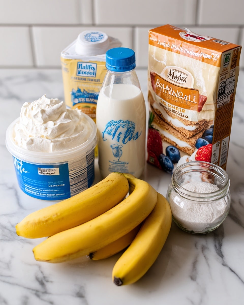 The image shows ingredients for making a dessert placed on a white marbled surface. From left to right, there is a white round container of whipped topping with a blue and white label, two yellow bananas resting in front, a clear glass bottle of organic milk with black text, a box of banana cream Jell-O pudding with orange and white packaging, a stick of salted butter with cream-colored wrapper and red text, a clear glass jar filled with white sugar, and a resealable bag of honey graham crumbs with images of a graham base topped with strawberries, blueberries, and raspberries on the package, which is mostly beige, blue, and yellow. The background is a white tiled wall. Photo taken with an iphone --ar 4:5 --v 7