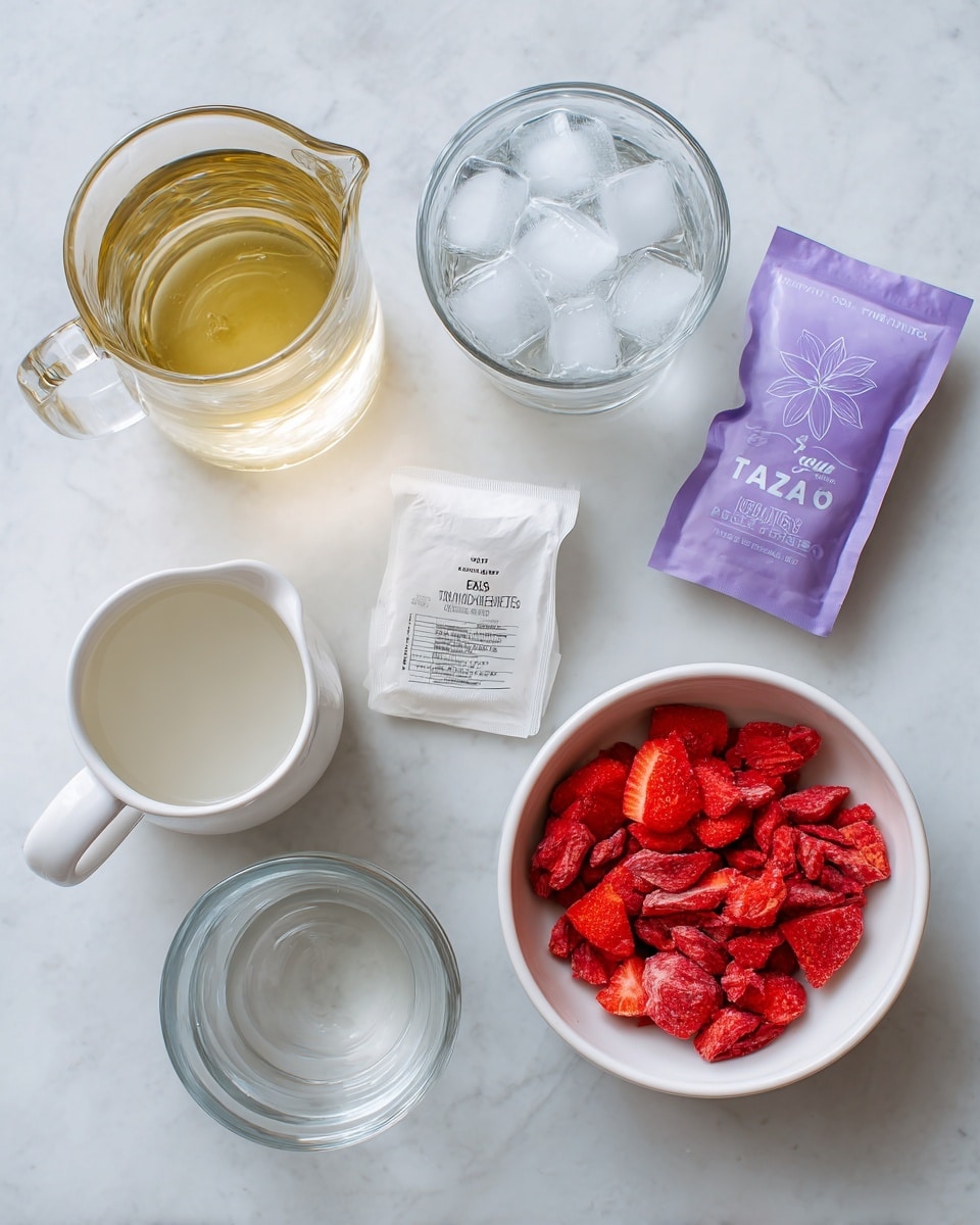 The image shows ingredients arranged on a white marbled surface for making a drink. There is a clear glass jug with a light golden liquid labeled as 1/2 cup white grape juice at the top left. To the right of it is a clear glass filled with ice and water. Below the jug is a small white pitcher with 1/2 cup coconut milk. In the center right is a white tea bag labeled Tazo Passion Tea next to its purple and white packet, showing that 2 bags are needed. At the bottom right is a white bowl filled with bright red freeze-dried strawberry pieces, labeled 1/4 cup freeze-dried strawberries. Near the bottom left corner is a small clear container with simple syrup, marked optional. photo taken with an iphone --ar 4:5 --v 7