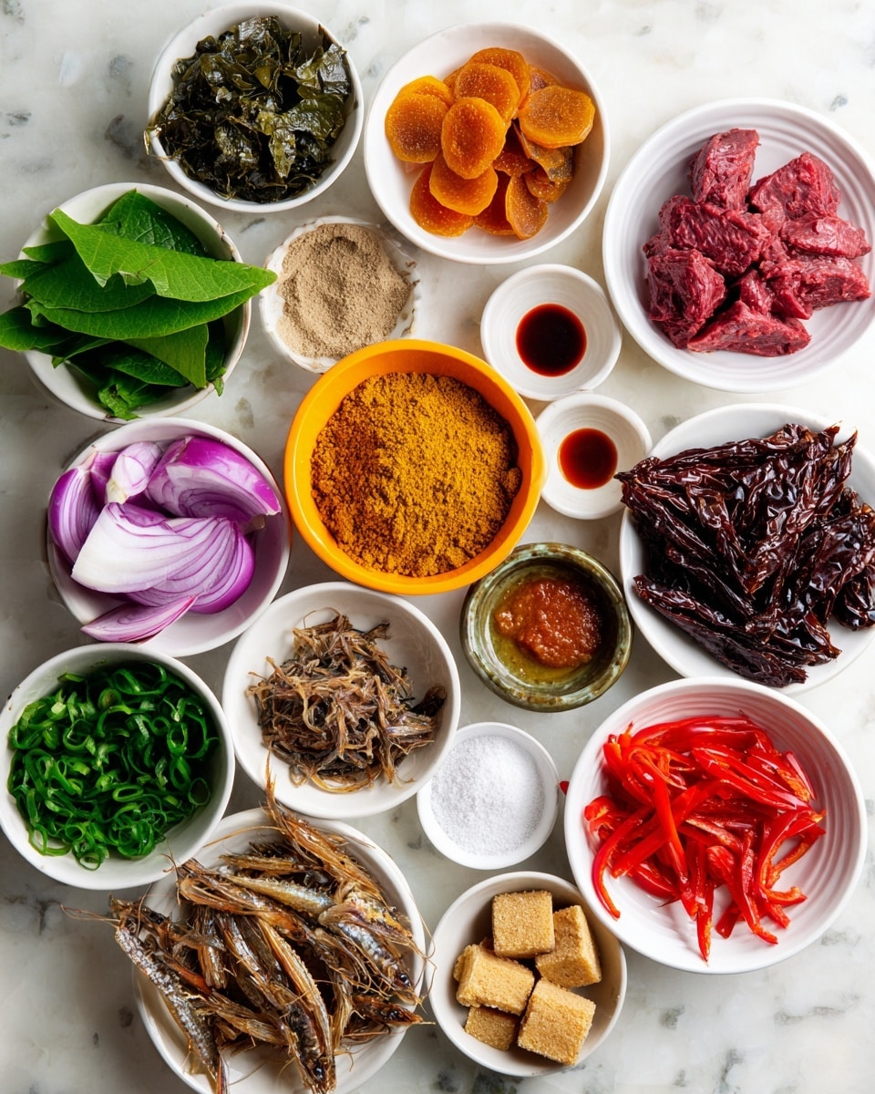 A collection of various ingredients is arranged on a white marbled surface in small white bowls, except for a larger orange bowl holding light tan egusi powder in the center. Surrounding it clockwise are bright green ugu leaves, a small amount of red oil in a white bowl, fresh deep green uziza leaves, purple onions in a white bowl, bright orange-red habanero peppers, brown dried canda slices in a white bowl, bright red raw beef chunks in a white bowl, dark brown dry fish in a white bowl, shredded brown crayfish in a white bowl, dark brown locust beans in a small bowl, dark golden smoked fish, red bell peppers in a white bowl, light brown stock fish chunks in a white bowl, salt in a white bowl with a small bowl of seasoning cubes nearby. The ingredients show a variety of colors and textures, with the white bowls making the colors stand out clearly photo taken with an iphone --ar 4:5 --v 7