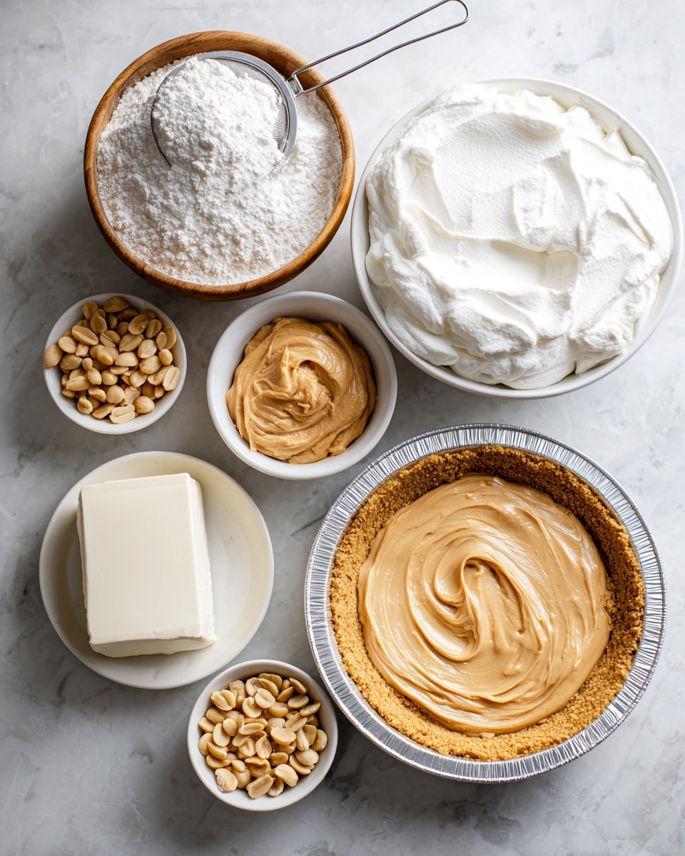 The image shows ingredients for a peanut butter pie arranged on a white marbled surface. There is a light brown graham cracker pie crust in a silver foil pan at the bottom right. Above the crust, a small white bowl holds creamy peanut butter with swirled texture. To the left, a wooden bowl filled with fine white powdered sugar has a small metal sifter resting on top. Next to the powdered sugar is a large white bowl of smooth, fluffy Cool Whip. Below that, a small white plate has a rectangular block of cream cheese with a smooth, clean surface. At the bottom left, a small white pitcher contains milk, looking smooth and glossy. Adjacent to the pitcher is a small white bowl filled with halved light tan peanuts. All items are neatly placed on the white marbled background. photo taken with an iphone --ar 4:5 --v 7