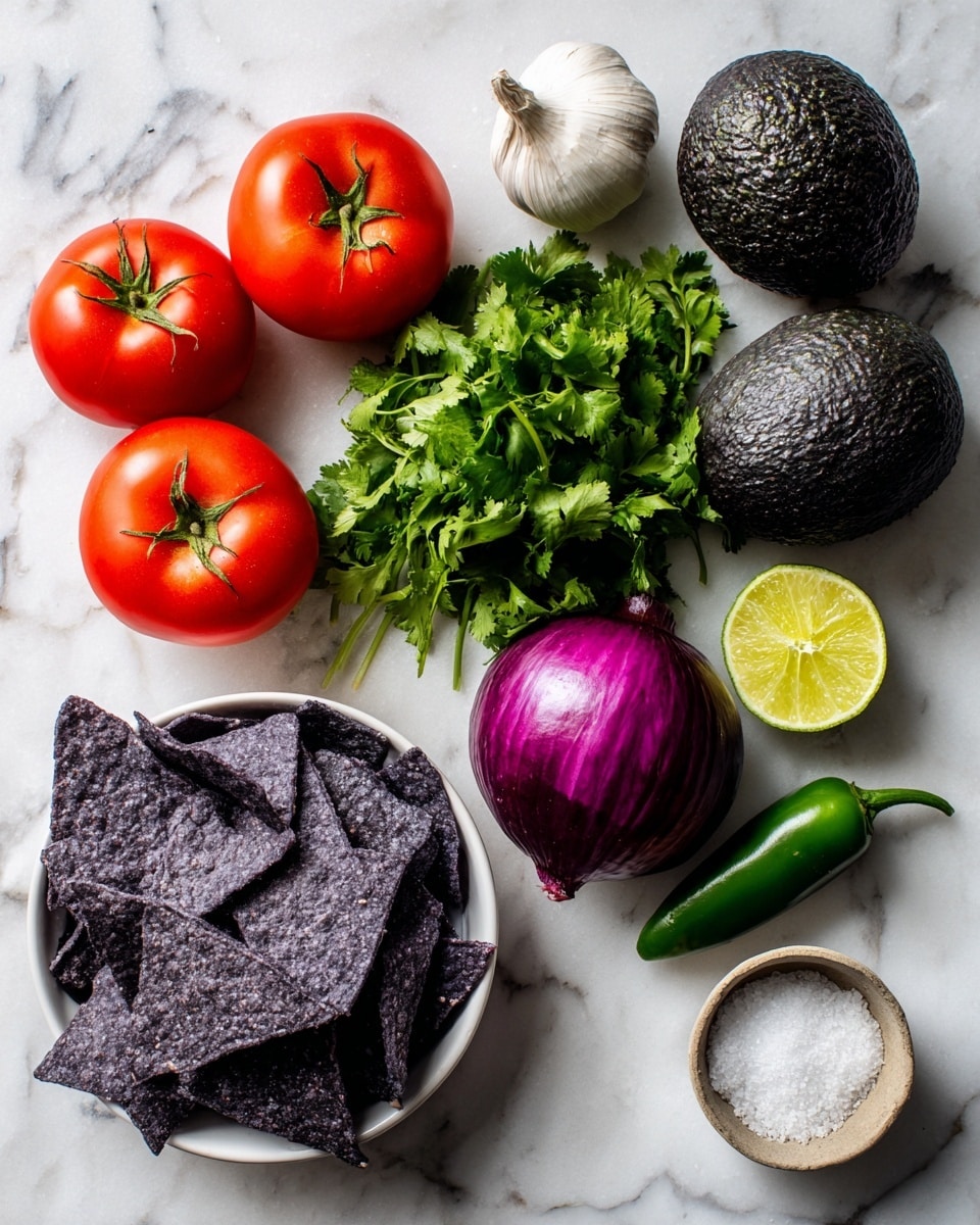 The image shows fresh ingredients for a dish arranged on a white marbled surface. There are two red tomatoes with green stems on the top left, a whole white garlic bulb above the center, and two dark green avocados placed to the right. Below the tomatoes is a bunch of bright green cilantro leaves with stems. In the center is a whole shiny red onion with a purple-red outer layer. A single green jalapeno pepper sits to the right of the onion. Near the bottom center is a cut lime half showing bright green juice. At the bottom left is a white bowl filled with dark purple tortilla chips, and to the bottom right is a small bowl with coarse white sea salt. photo taken with an iphone --ar 4:5 --v 7