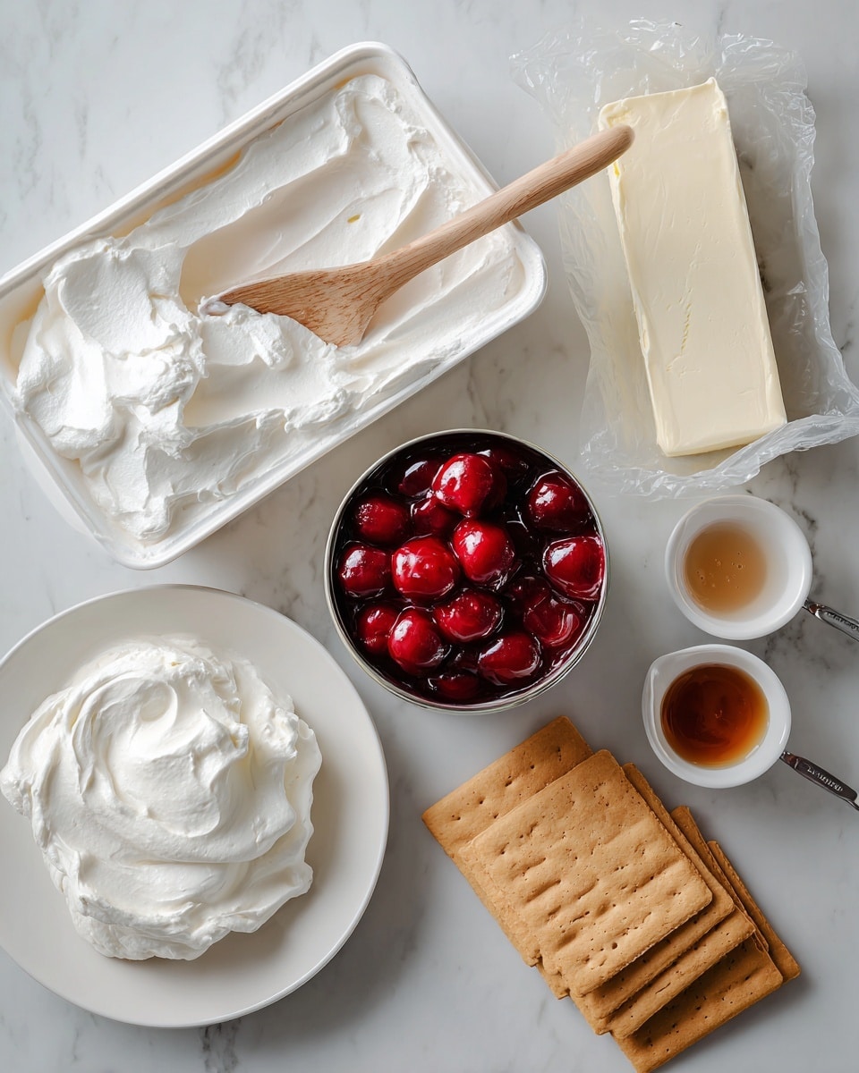 The image shows several containers and items arranged on a white marbled surface. At the top left is an open white plastic container filled with fluffy white marshmallow fluff, with a wooden spoon inside. To the right is an open cream cheese package with a block of white cream cheese. Below the marshmallow fluff on the left is a white plate with smooth, white whipped topping and a silver spoon resting in it. In the center below the cream cheese is a black can filled with bright red cherry pie filling, with a silver spoon lifting some cherries out. To the right are two small white bowls with silver measuring spoons containing clear vanilla and light brown almond extract. At the bottom right are several pale golden brown graham crackers stacked slightly overlapping each other. Photo taken with an iphone --ar 4:5 --v 7
