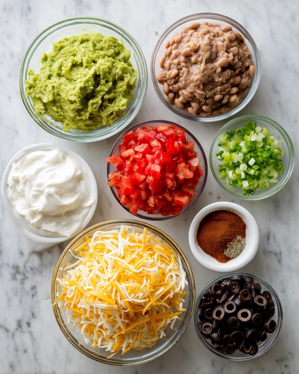Several clear and white bowls with different ingredients are spread over a white marbled surface. Starting at the top left, there is a glass bowl filled with smooth, bright green guacamole. To the right of it is another glass bowl holding chunky, light brown refried beans. Below the guacamole bowl is a white bowl with finely diced red tomatoes. Next to it, toward the center, is a small clear bowl filled with smooth white sour cream. Below these, there is a large glass bowl piled with bright yellow shredded cheddar cheese. To the right, several smaller white bowls hold dark sliced black olives, light brown taco seasoning powder, and finely chopped green onions. photo taken with an iphone --ar 4:5 --v 7