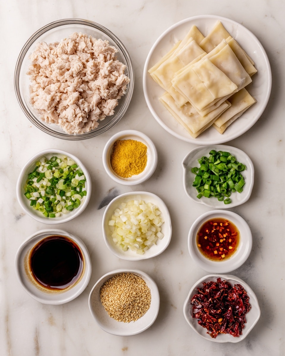 A top view of various ingredients arranged neatly on a white marbled surface, each in small white bowls or dishes. On the left side is a clear glass bowl filled with pale pink ground chicken, next to it is a white plate holding square wonton wrappers that are light beige in color. To the right, there are small white bowls and dishes with different spices and chopped ingredients: a light yellow garlic powder, a mix of green-yellow chicken bouillon powder, white chopped onion, bright green chopped green onions, yellow grated ginger, dark red chili crisp, light brown sesame seeds, a dark glossy soy sauce, rich brown sugar, crushed red pepper flakes, light yellow sesame oil, and minced garlic. Each ingredient stands out with its unique color and texture on the clean white marbled background. Photo taken with an iphone --ar 4:5 --v 7