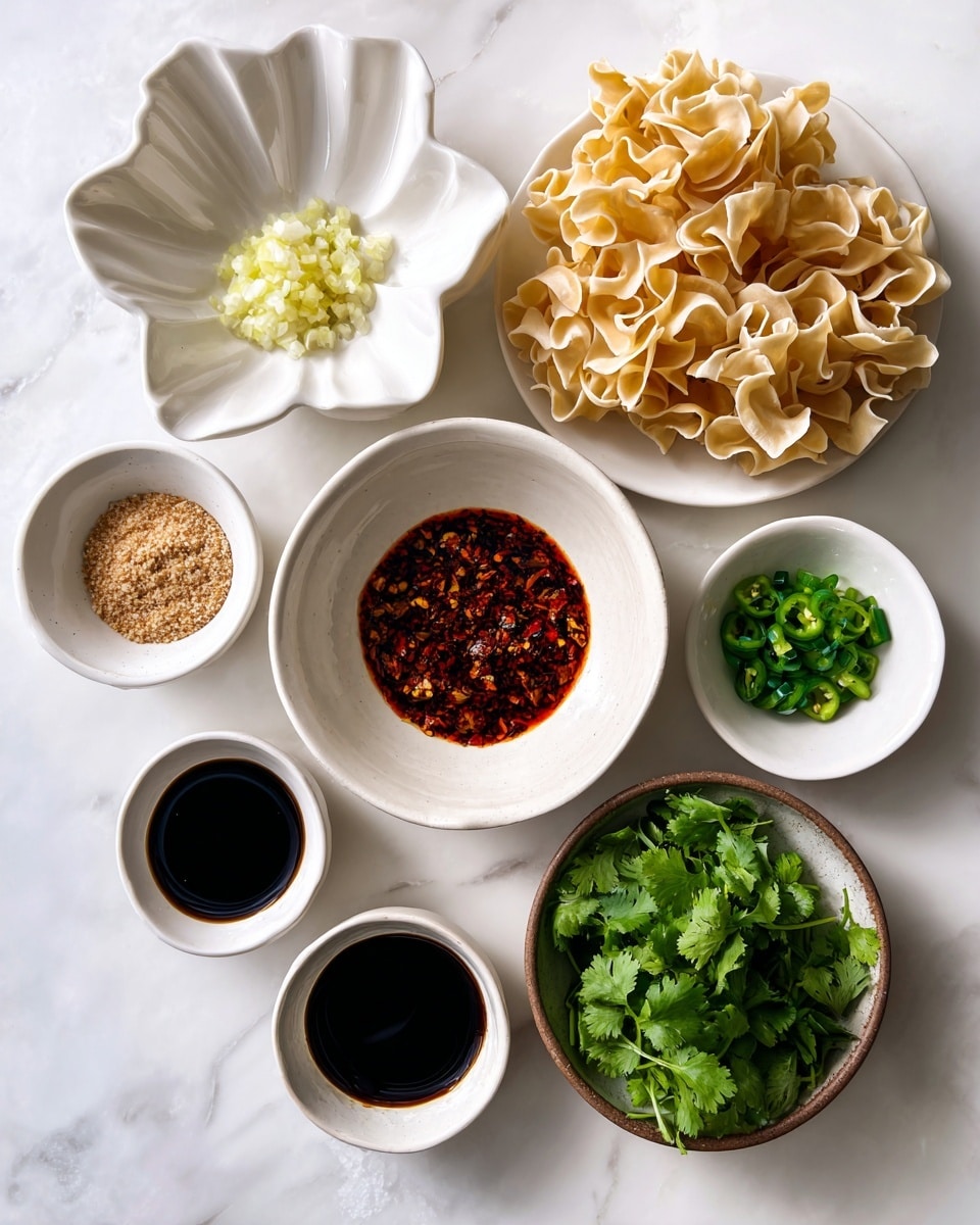 The image shows several white bowls and plates arranged on a white marbled surface. In the top right, there are three light beige, wavy blocks of noodles stacked loosely. Below the noodles and from left to right, there is a round white bowl filled with dark red chili crisp oil with visible chili chunks, a small white bowl with finely chopped pale yellow garlic, a white flower-shaped bowl with bright green chopped jalapeno, and a round white bowl with light brown, grainy brown sugar. Near the bottom, from left to right, there are three small round white bowls with dark liquids: soy sauce, black vinegar, and dark soy sauce. On the far right, a brown bowl is filled with bright green fresh cilantro leaves. The overall set-up is neat and clear, with each ingredient distinct and colorful. Photo taken with an iphone --ar 4:5 --v 7