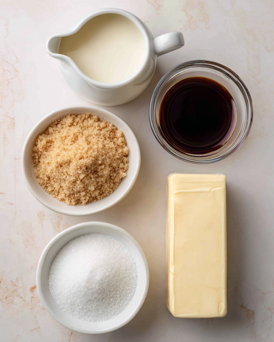The image shows five ingredients arranged on a white marbled surface. At the top left, there is a small white pitcher filled with off-white heavy cream, next to it on the right is a small glass bowl with dark brown vanilla extract. Below the pitcher, there is a white bowl filled with light brown sugar that has a soft, crumbly texture. To the right of the sugar bowl, there is a rectangular stick of pale yellow salted butter . At the bottom center, there is a small white bowl filled with fine, white granulated sugar. Photo taken with an iphone --ar 4:5 --v 7