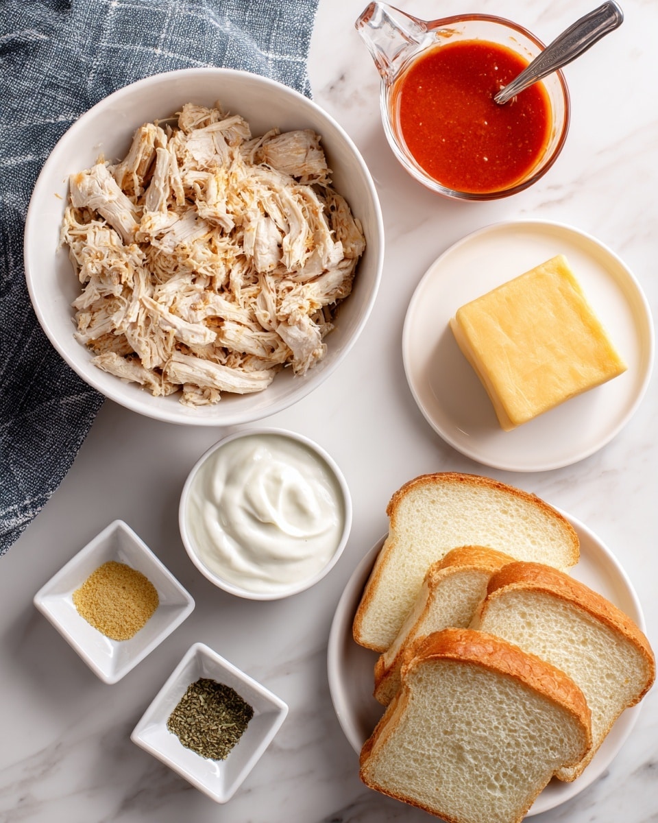 A white bowl holds shredded light brown chicken with a spoon inside it, sitting on a white marbled surface. Above it to the right, there is a small clear glass measuring cup filled with bright red buffalo sauce. Further right, a white plate holds a solid yellow square block of cheese. Below the bowl, a small white ramekin contains thick white sour cream. To the far bottom left, a white square dish displays three spices in layers: pale yellow garlic powder, dark green dried basil, and black pepper. On the right side of the image, a white plate holds six slices of light golden yellow bread, arranged overlapping each other. The entire scene is set on a white marbled surface with a corner of a blue and gray cloth visible on the left side. Photo taken with an iphone --ar 4:5 --v 7