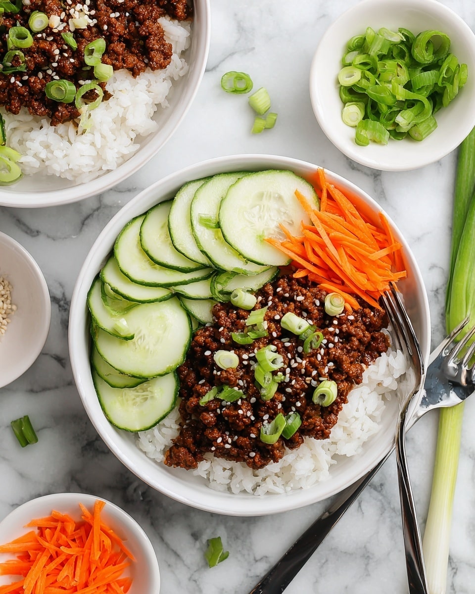 The image shows two white bowls filled with a three-layered dish placed on a white marbled surface. In each bowl, the bottom layer consists of fluffy white rice, visible under the other ingredients. The middle layer is ground beef cooked to a dark brown color, sprinkled with white sesame seeds and small pieces of chopped green onions. On top and to one side of the rice and beef are thin, round slices of cucumber arranged in a partial circle, pale green with dark green edges, topped with small shreds of bright orange carrot. Next to the cucumber slices, orange carrot sticks add extra color and texture. A black and silver fork is placed in the lower bowl. Around the bowls, shredded carrot and cucumber slices are in smaller white bowls, and fresh green onions are scattered on the surface. photo taken with an iphone --ar 4:5 --v 7