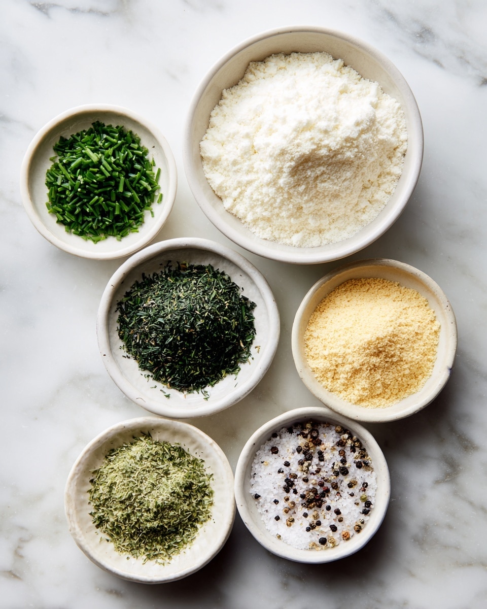 The image shows seven small white dishes on a white marbled surface, each holding different dry ingredients. At the top center is a bowl filled with a creamy white powder labeled buttermilk powder. Below and to the left is a dish with chopped dried green chives, and to the top right is a dish with dark green parsley flakes. In the middle, a dish contains light yellow onion powder, and to the right of that is a dish with pale yellow garlic powder. At the bottom left is a dish with finely crushed dark green dill weed. Finally, at the bottom right is a dish with coarse salt and mixed black and white pepper. Each ingredient is clearly shown with its texture and color visible. Photo taken with an iphone --ar 4:5 --v 7