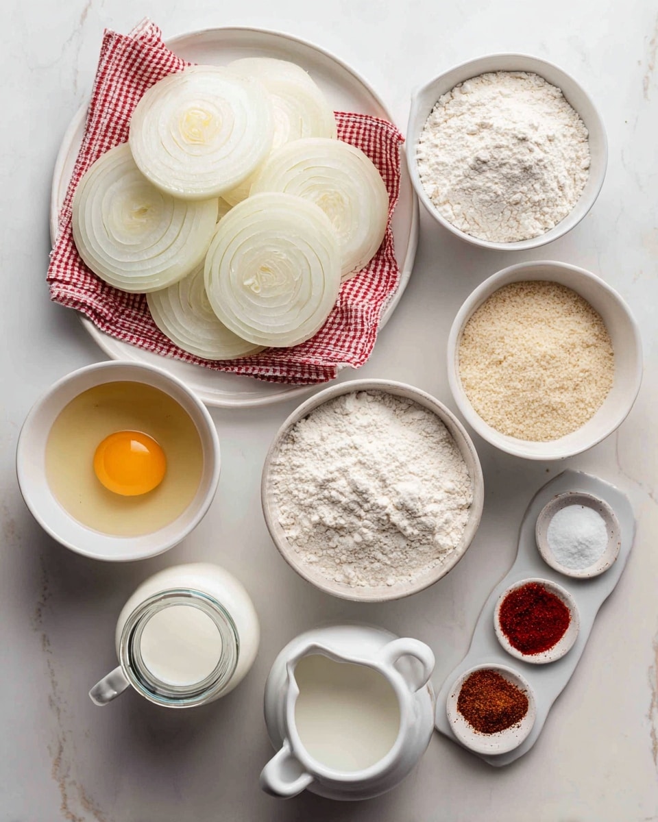 The image shows onion rings ingredients arranged neatly on a white marbled surface. At the top left, there is a small white round tray lined with red and white checkered paper holding several large fresh white onion slices with thick rings. Below and to the left, there is a white bowl filled with fine white flour, and next to it a smaller white bowl filled with coarse light beige breadcrumbs. In the center-right, a medium white bowl contains a pale yellow liquid, likely oil, and above it, a small clear glass bowl holds one raw egg with a yellow yolk and clear white. A small clear glass jar filled with white milk is placed below the oil bowl. At the bottom right, a small white dish with two handles holds four sections of spices: white salt, black pepper, red paprika, and light beige garlic powder. In the middle between the flour and milk bowls, a small white bowl contains white baking powder. The ingredients are spaced out evenly with clear details, lighting is bright and soft with no shadows. Photo taken with an iphone --ar 4:5 --v 7