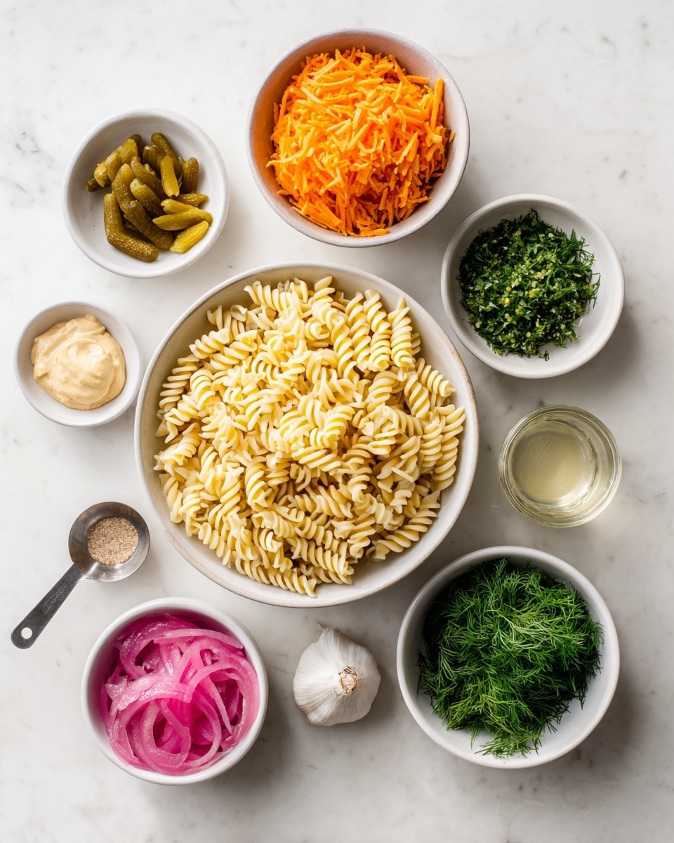 The image shows eight white bowls arranged on a white marbled surface, each containing different food ingredients. The largest bowl in the center holds pale yellow rotini pasta with a smooth texture. Above it to the left is a bowl filled with bright orange shredded carrot, finely shredded and soft-looking. To the right of the carrot bowl, there is a bowl with chopped fresh parsley and fresh dill, showing deep green leafy textures mixed together. Below this bowl is a smaller bowl containing pink pickled red onions with a shiny, wet look. Near the middle right side is a small glass cup filled with clear pickle brine. At the bottom left of the pasta bowl, a white bowl holds a glossy, creamy easy vegan mayo with a smooth surface. Next to it on the left is a metal measuring spoon containing thick, light brown Dijon mustard. To the right of the pickle brine is a white bowl holding chopped dill pickles, showing greenish-yellow pieces with a moist texture. A single garlic clove is placed between the pickle brine and the pickled onions. The whole setup is neat and clean with a bright, natural light. Photo taken with an iphone --ar 4:5 --v 7