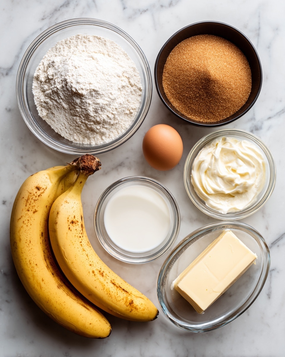 A top view of baking ingredients on a white marbled surface, including a white bowl filled with brown sugar at the bottom right, a clear glass bowl with white flour at the bottom left, two ripe yellow bananas with brown spots placed on the right side, a small clear bowl with white cream near the center, a single brown egg just beside it, a black bowl holding white baking powder above the cream, and a stick of unsalted butter with a pale yellow wrapper at the top. photo taken with an iphone --ar 4:5 --v 7