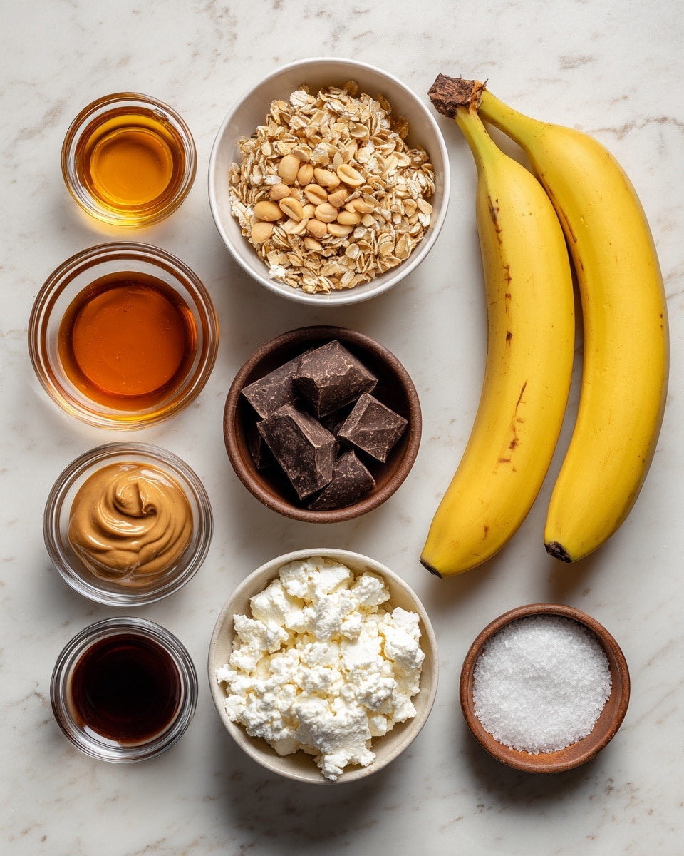 A top-down view of various ingredients arranged neatly on a white marbled surface. There are two yellow bananas with a few small brown spots placed side by side on the right. Above the bananas is a small brown bowl filled with chopped peanuts, and to the left of it is a white bowl holding granola with visible oat clusters and coconut flakes. Near the top center, a clear glass bowl contains amber-colored honey, and below the granola is a small brown bowl with dark vanilla extract. To the lower left is a clear glass bowl with smooth peanut butter, next to it is another clear glass bowl filled with dark chocolate chunks. On the bottom right, a white bowl is filled with white cottage cheese, and beside it, a small brown bowl holds flaky sea salt. Each ingredient has a small label in simple black text identifying it. photo taken with an iphone --ar 4:5 --v 7