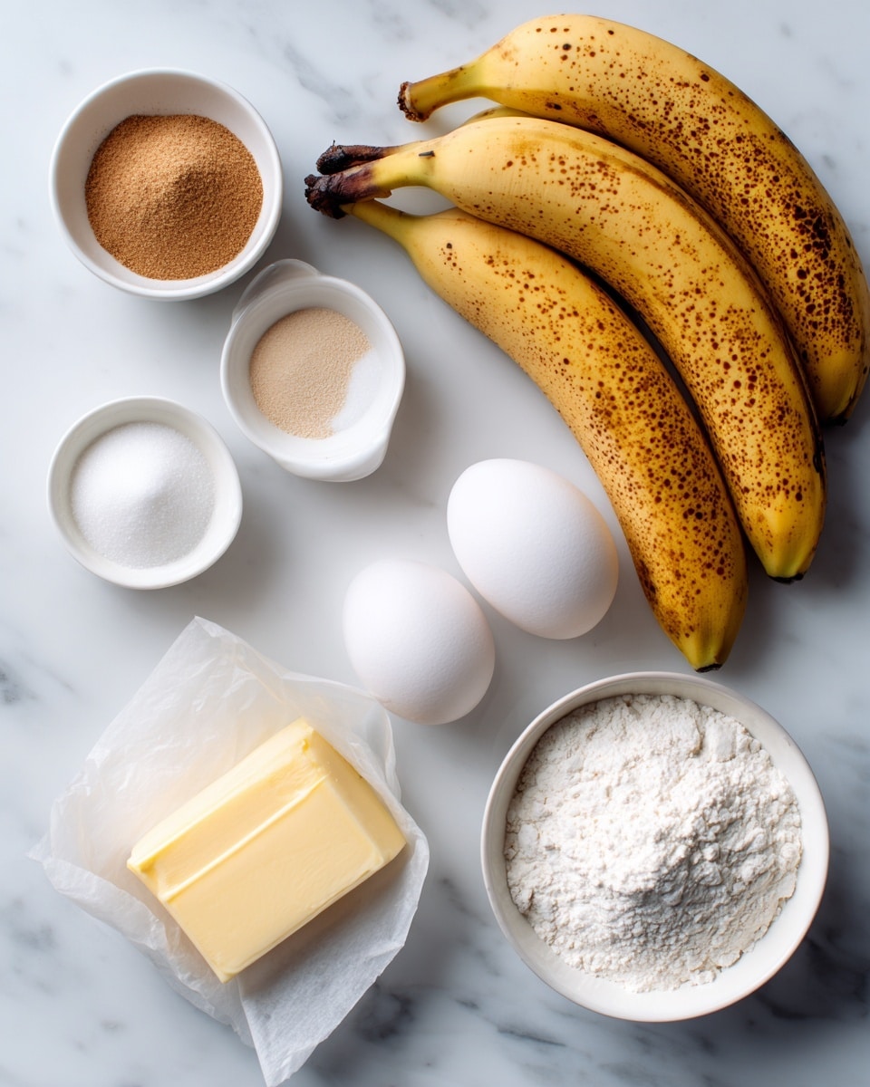 In this image, there are fresh bananas with brown spots lying on a white marbled surface in the top right corner. Below the bananas are two white eggs placed side by side. To the left of the eggs, there are three small white dishes with different contents: one has a light brown powder, another has white granules, and the last one has a brown liquid. Near the bottom left corner, there is a stick of light yellow butter wrapped in paper. Two larger white bowls are also visible, one filled with white flour and the other with white sugar. The overall setup is neat, with ingredients clearly separated on the white marbled surface photo taken with an iphone --ar 4:5 --v 7