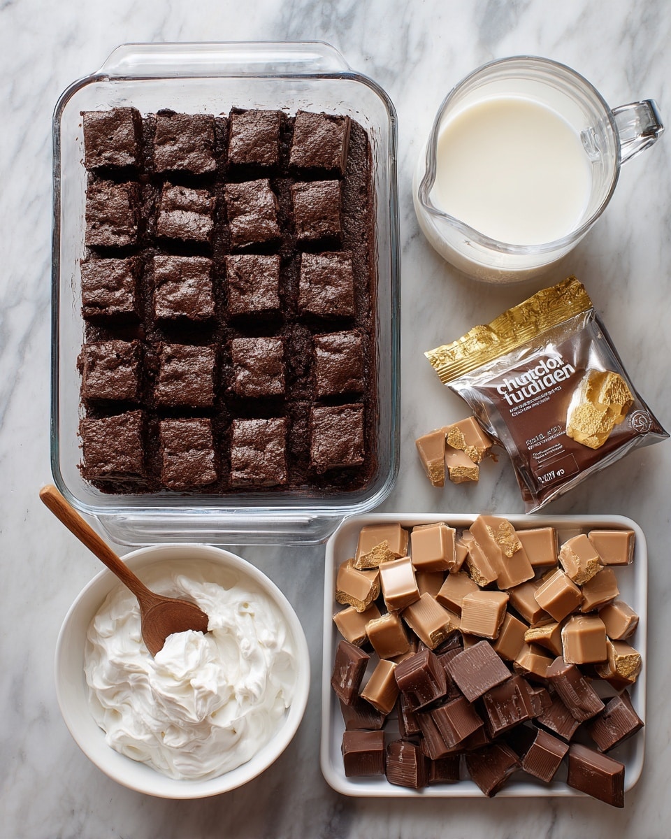 A clear rectangular glass baking dish filled with one layer of dark brown chocolate cake cut into small squares, placed on a white marbled surface. Below it, a glass measuring cup holds white milk, and next to it, there is an open package showing a dark brown powder labeled chocolate pudding on light brown paper. In the lower left corner, a white bowl contains white cool whip with a wooden spoon resting inside it. On the right side, a white tray is covered with chopped pieces of Heath candy bars in light to dark brown shades with one whole candy bar at the edge. All items are arranged neatly, showing ingredients for the chocolate cake. Photo taken with an iphone --ar 4:5 --v 7